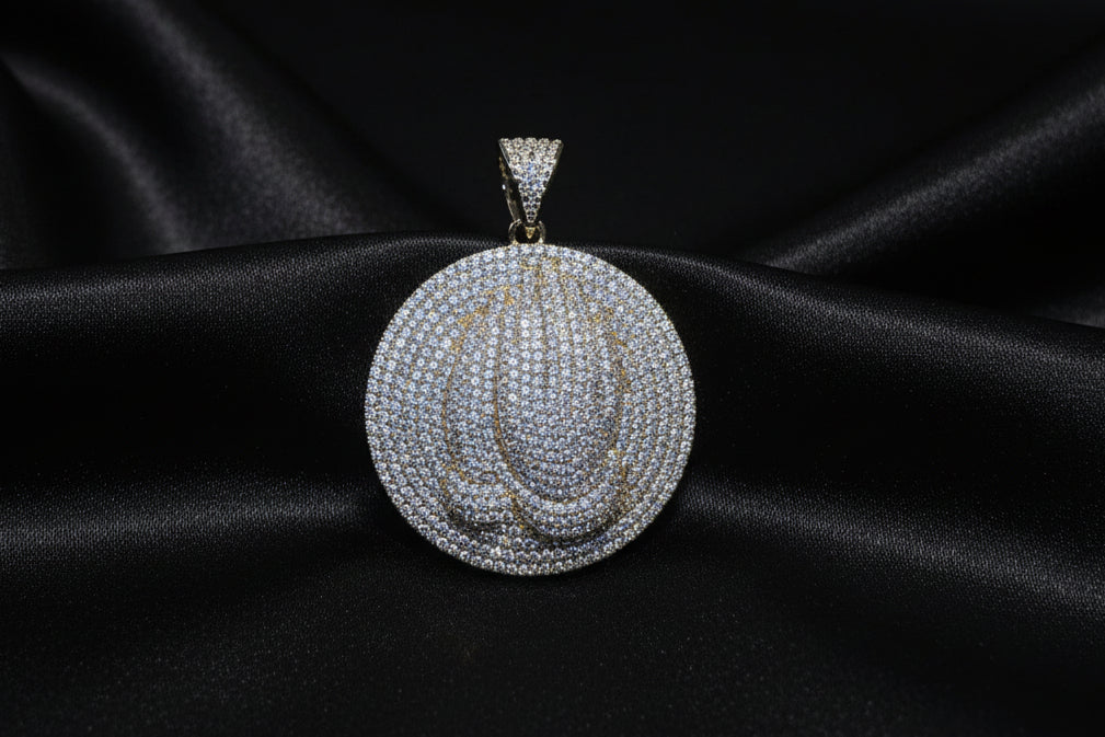 Iced out gold plated prayer hand pendant
