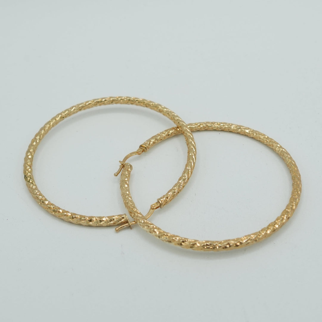 Boucle d'oreille simple plaquée or