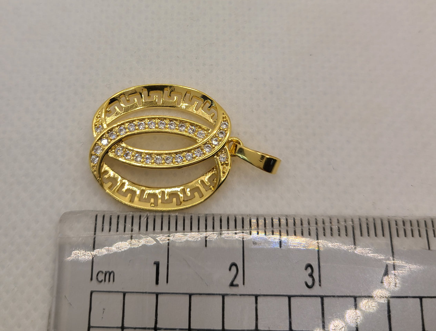 Pendentifs design Versace plaqués or