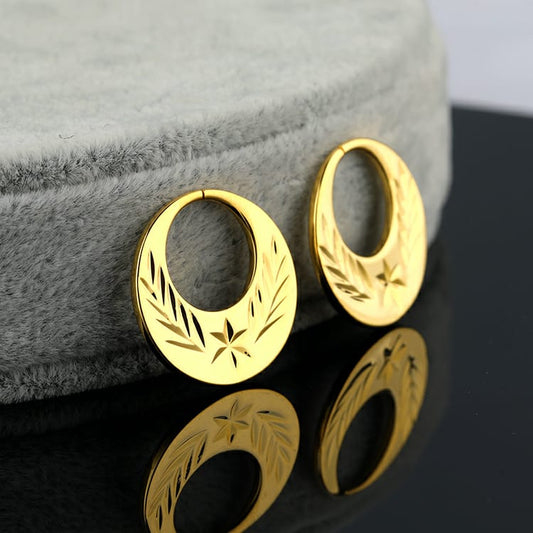 Boucles d'oreilles Nattiyan plaquées or en forme d'étoile