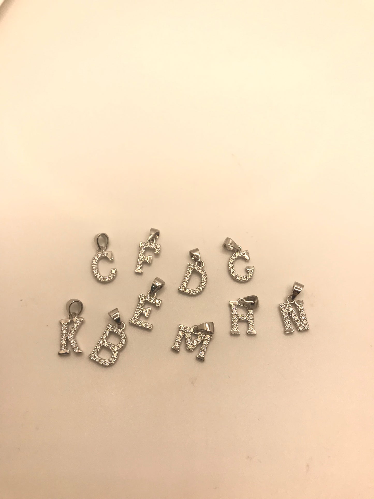 Pendentif lettre initiale en argent sterling