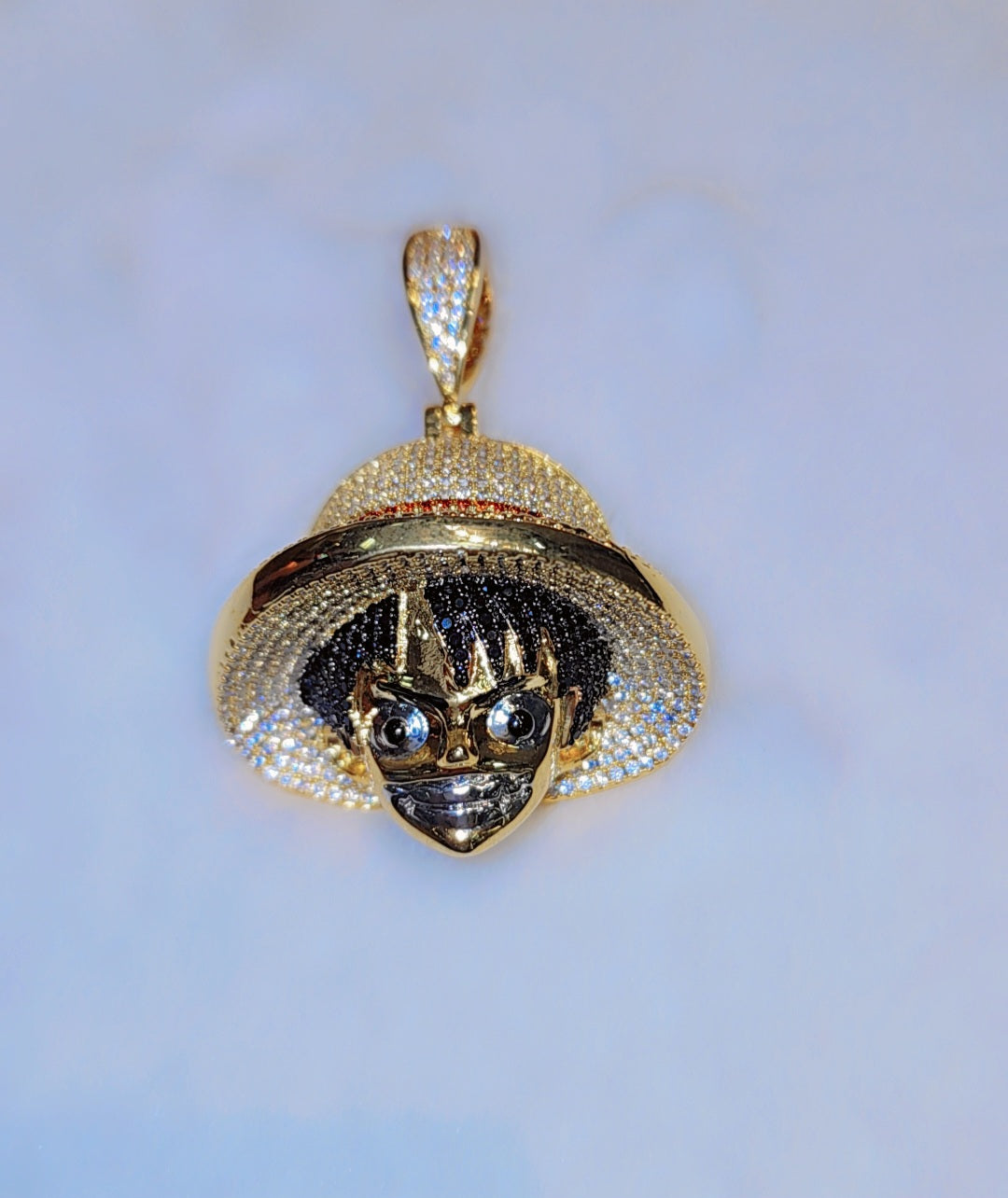 Iced out gold plated One Piece Anime pendant