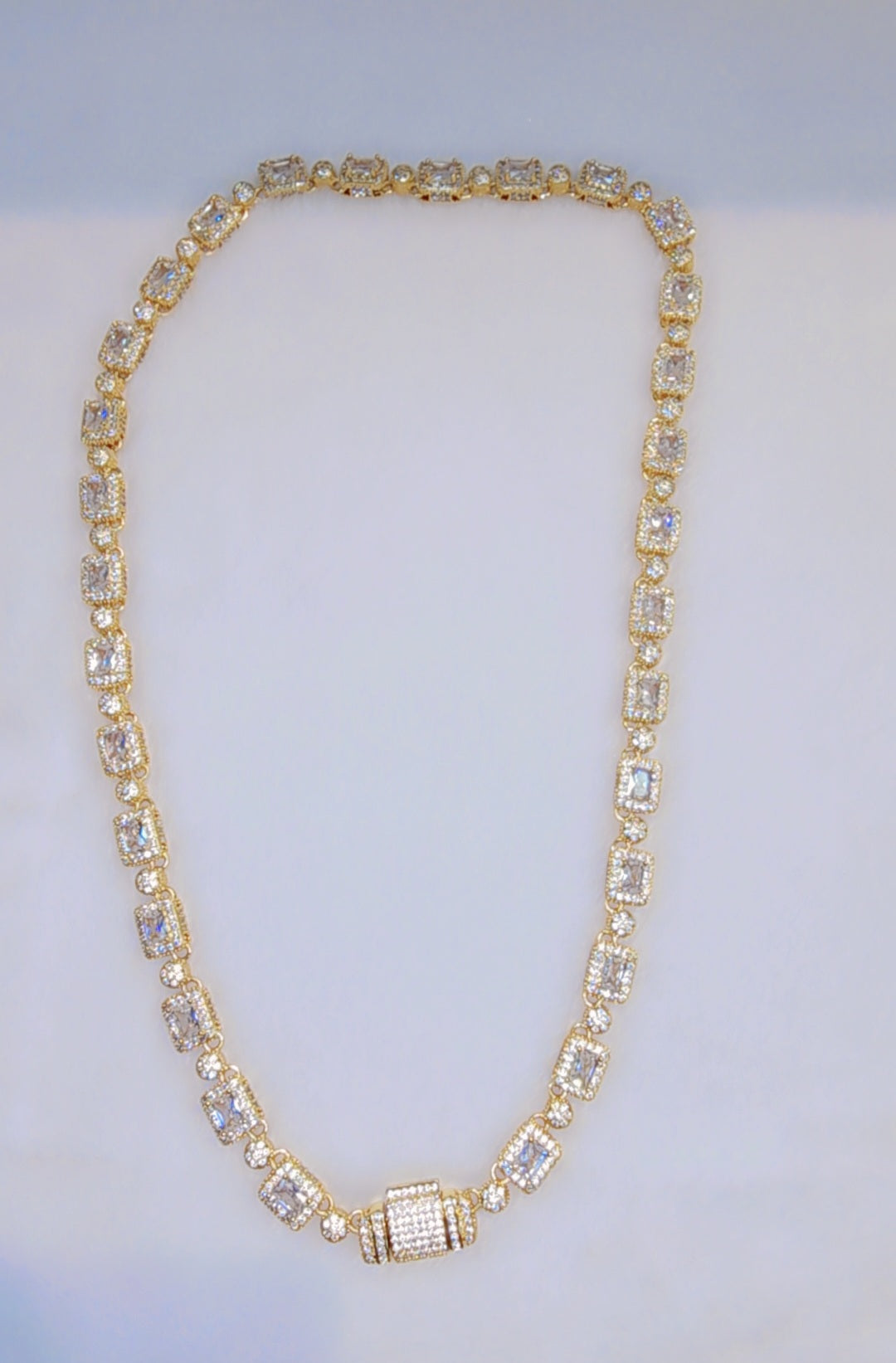 Iced out gold plated chain