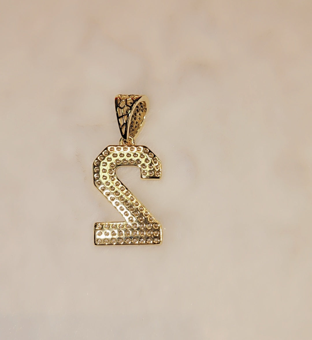 Iced out gold plated Number pendant