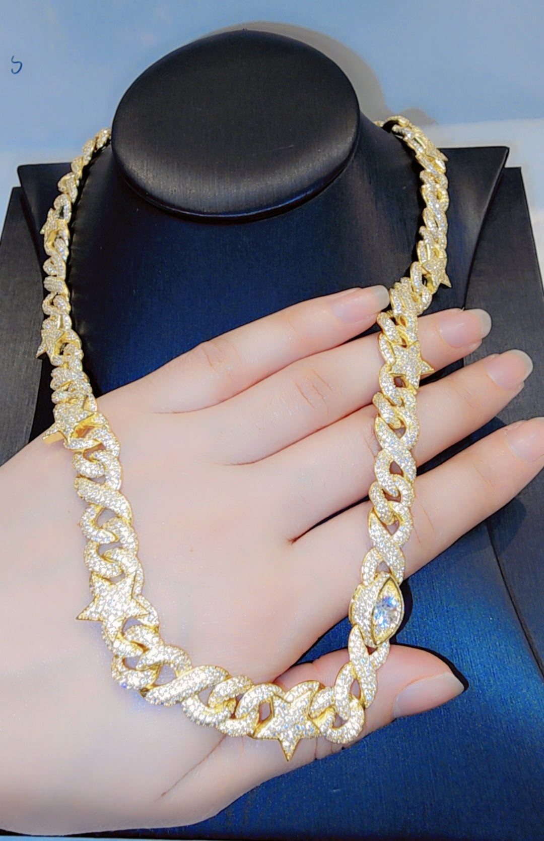 Iced out gold plated chain