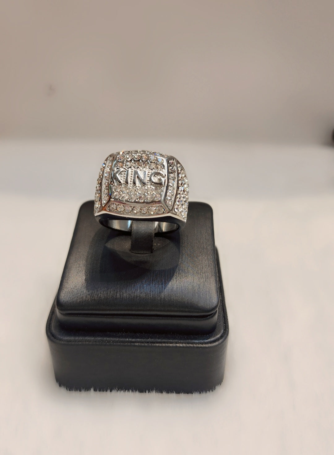 Iced out white gold plated King ring