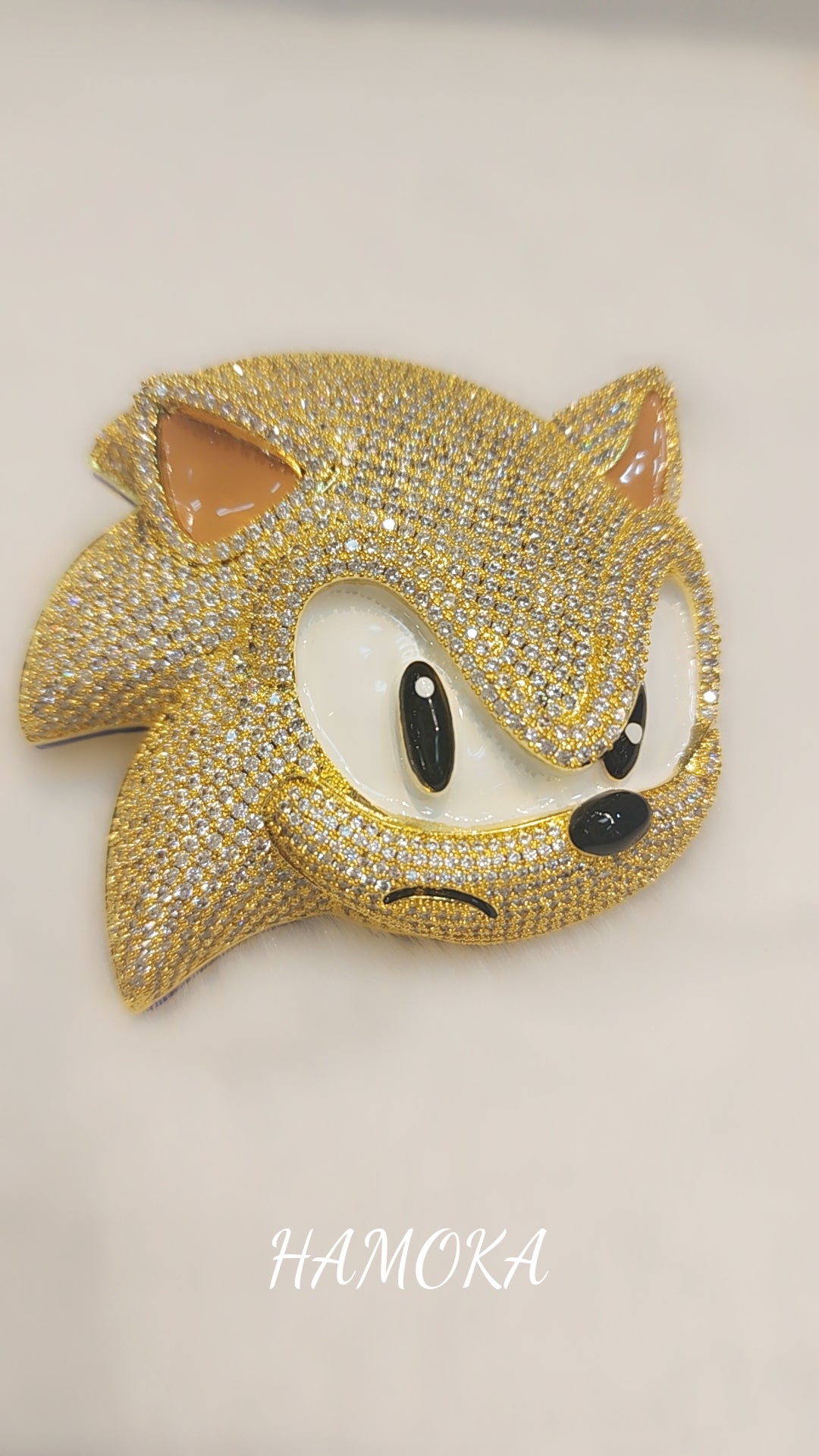 Iced out gold plated sonic pendant