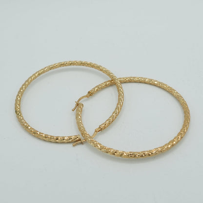 Boucle d'oreille simple plaquée or