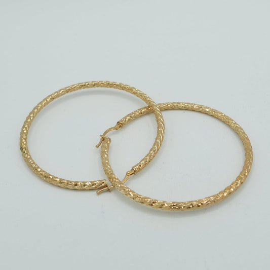 Boucle d'oreille simple plaquée or