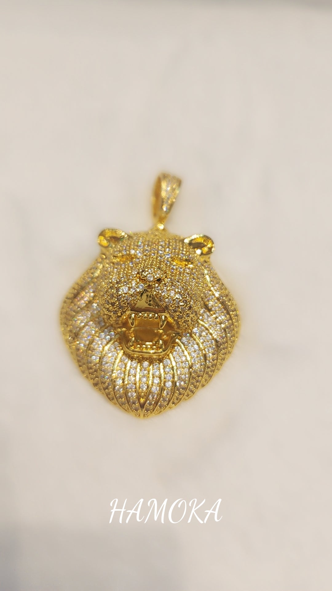 Gold plated iced out pendant