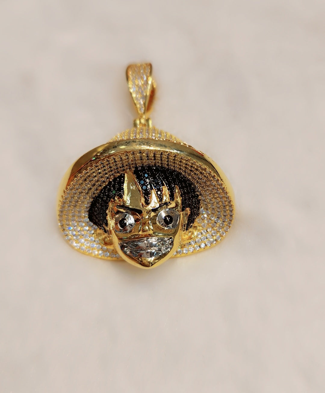 Iced out gold plated One Piece Anime pendant