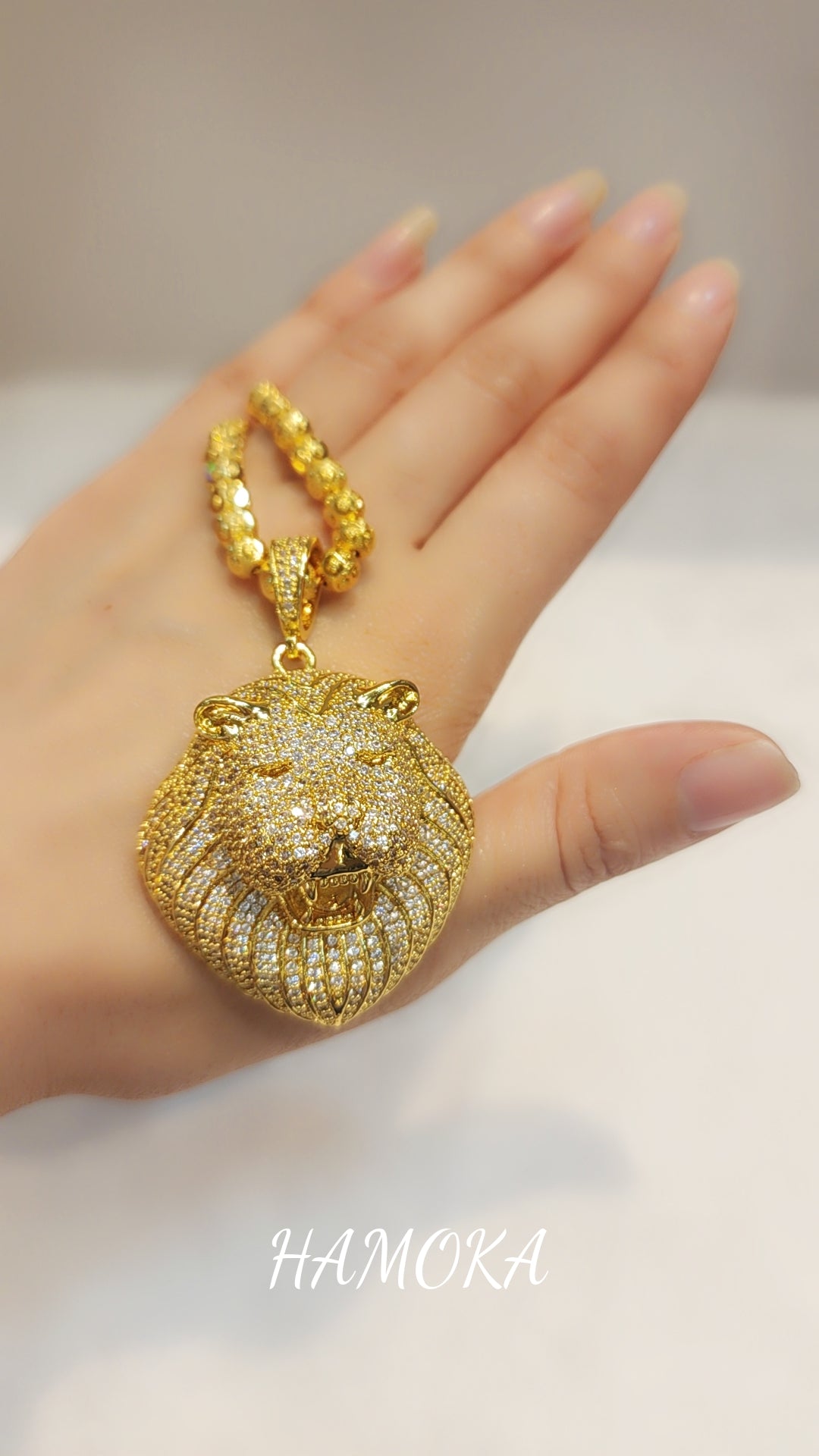 Gold plated iced out pendant