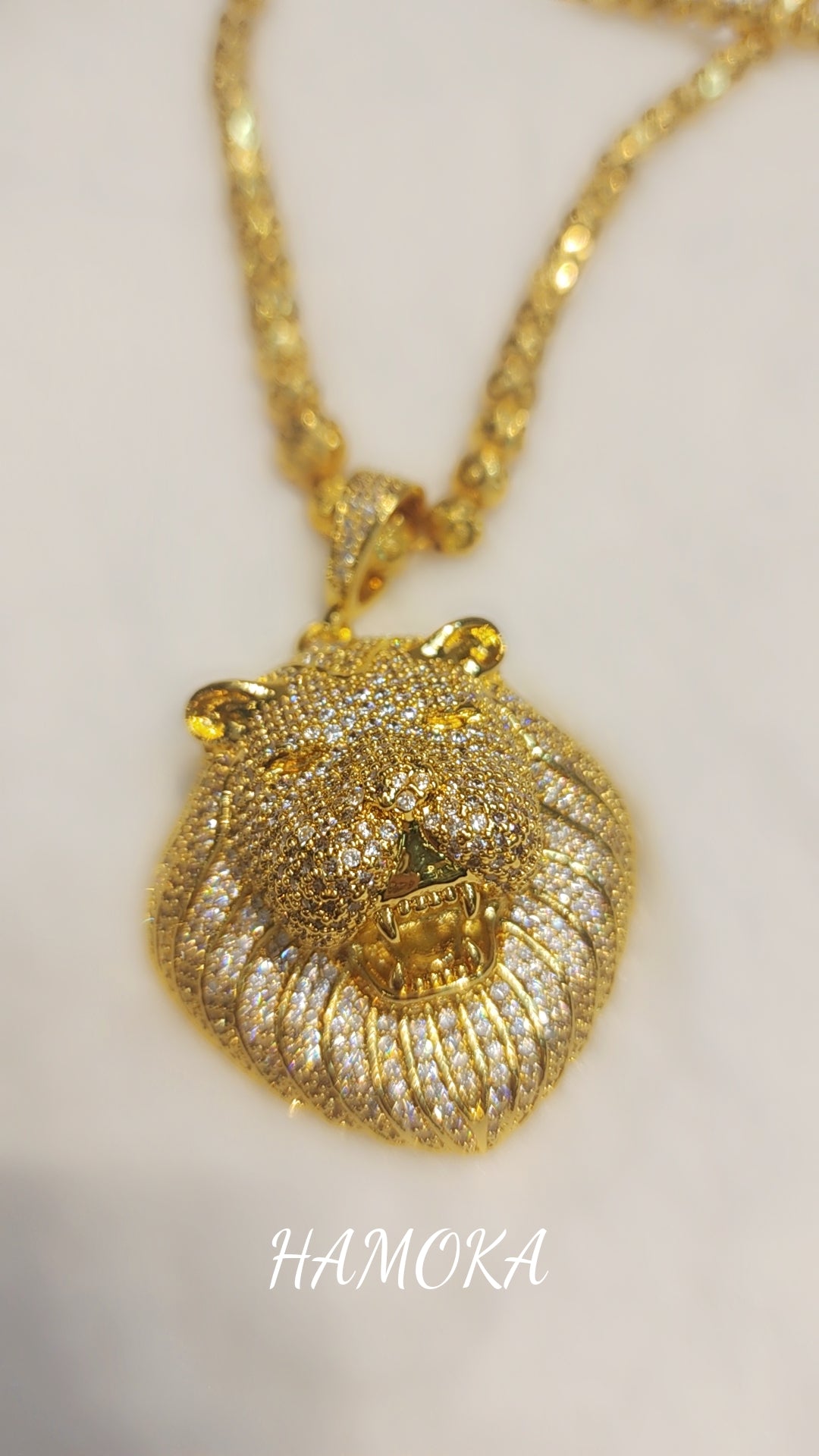 Gold plated iced out pendant