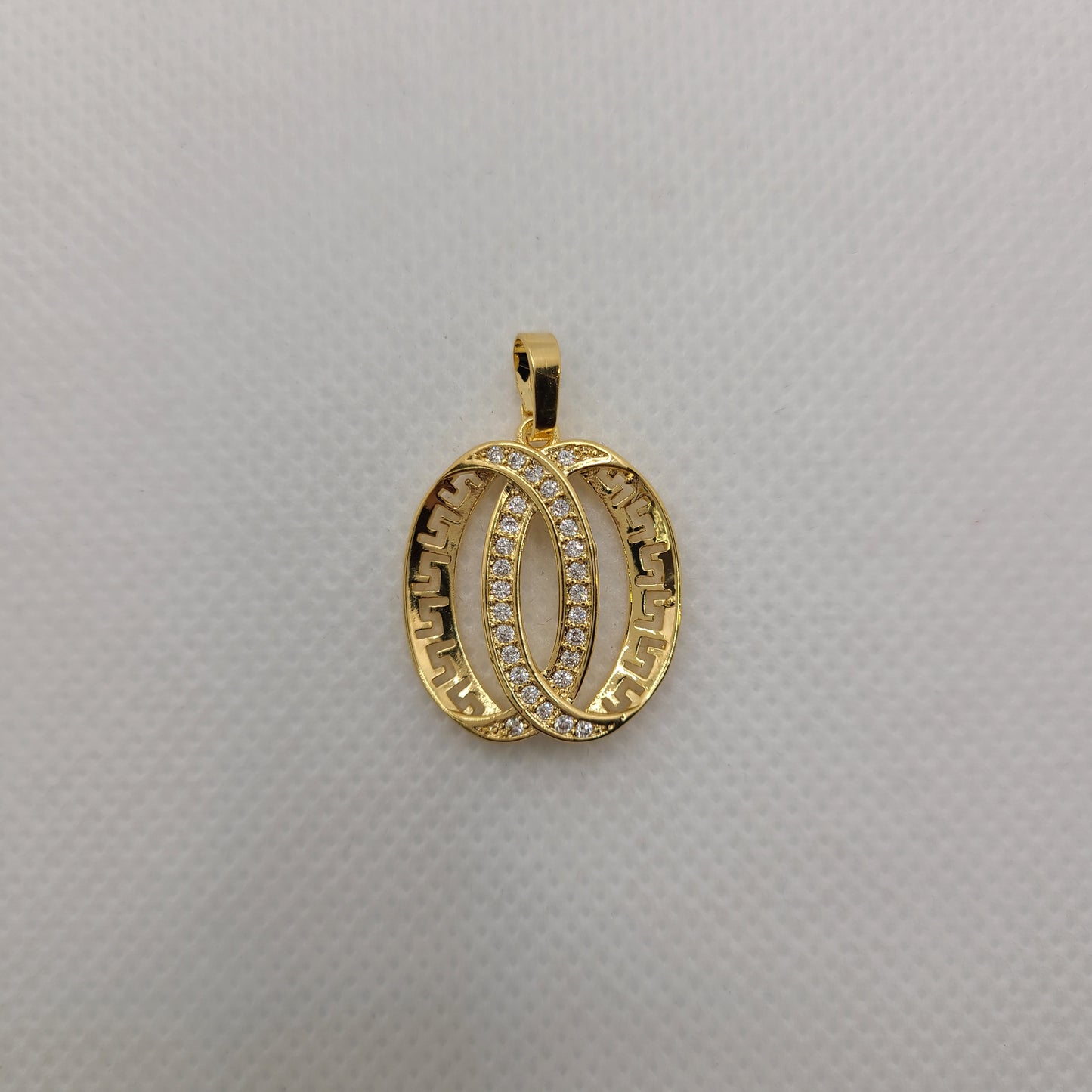 Gold pated versace design pendants