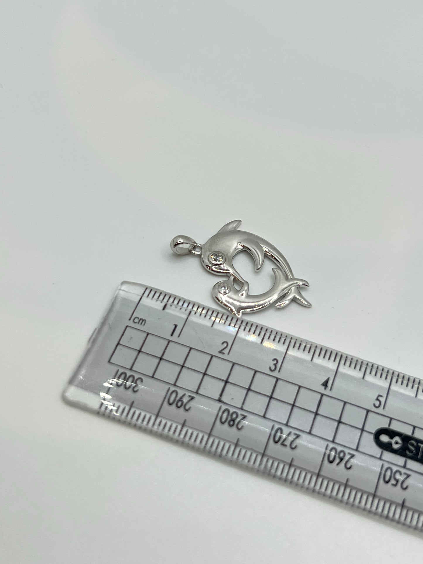 Real silver dual dolphin pendant