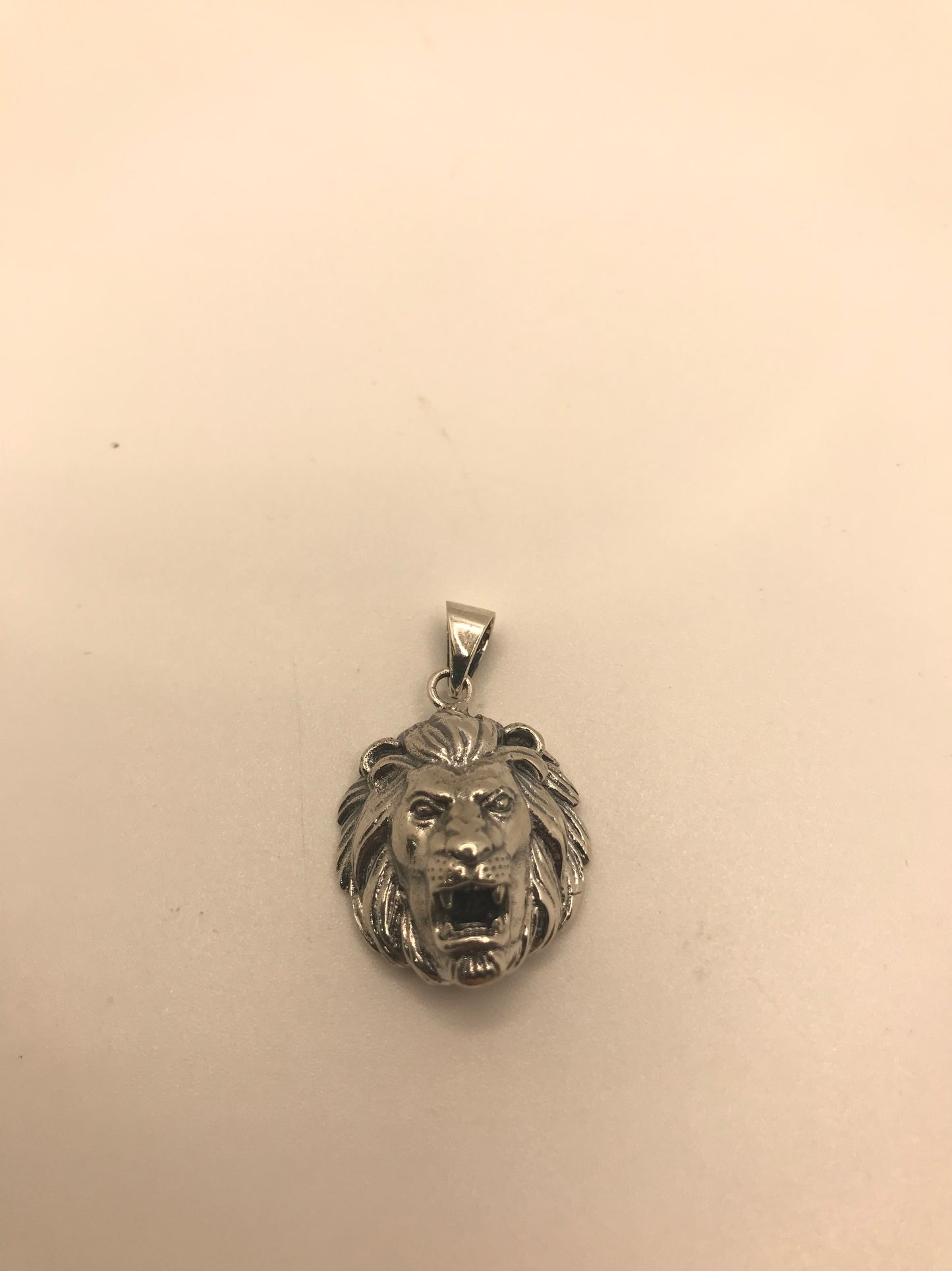 Sterling silver lion pendant