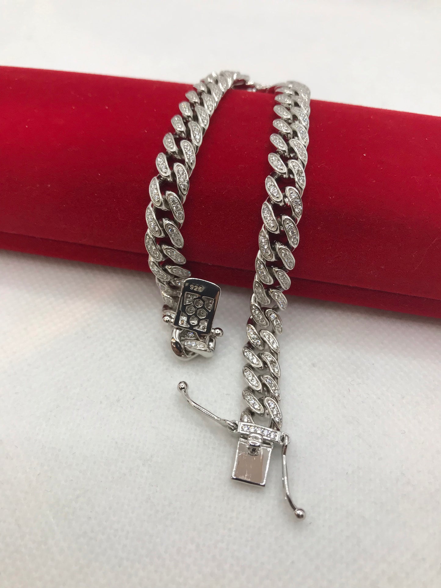 Sterling silver cuban linked iced out bracelet