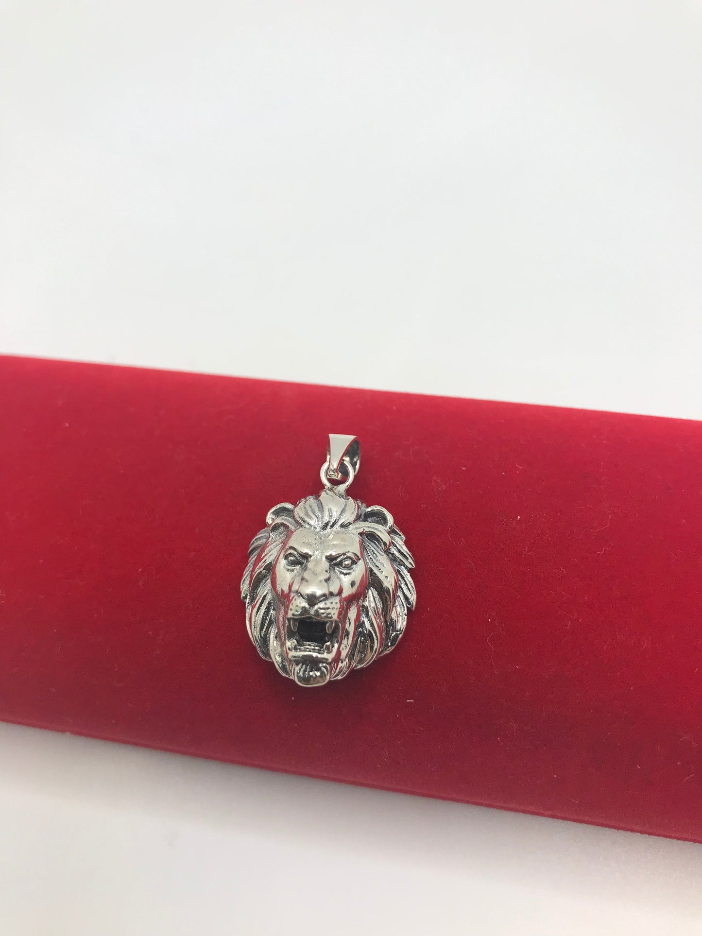 Sterling silver lion pendant